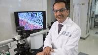 Male doctor showing test results